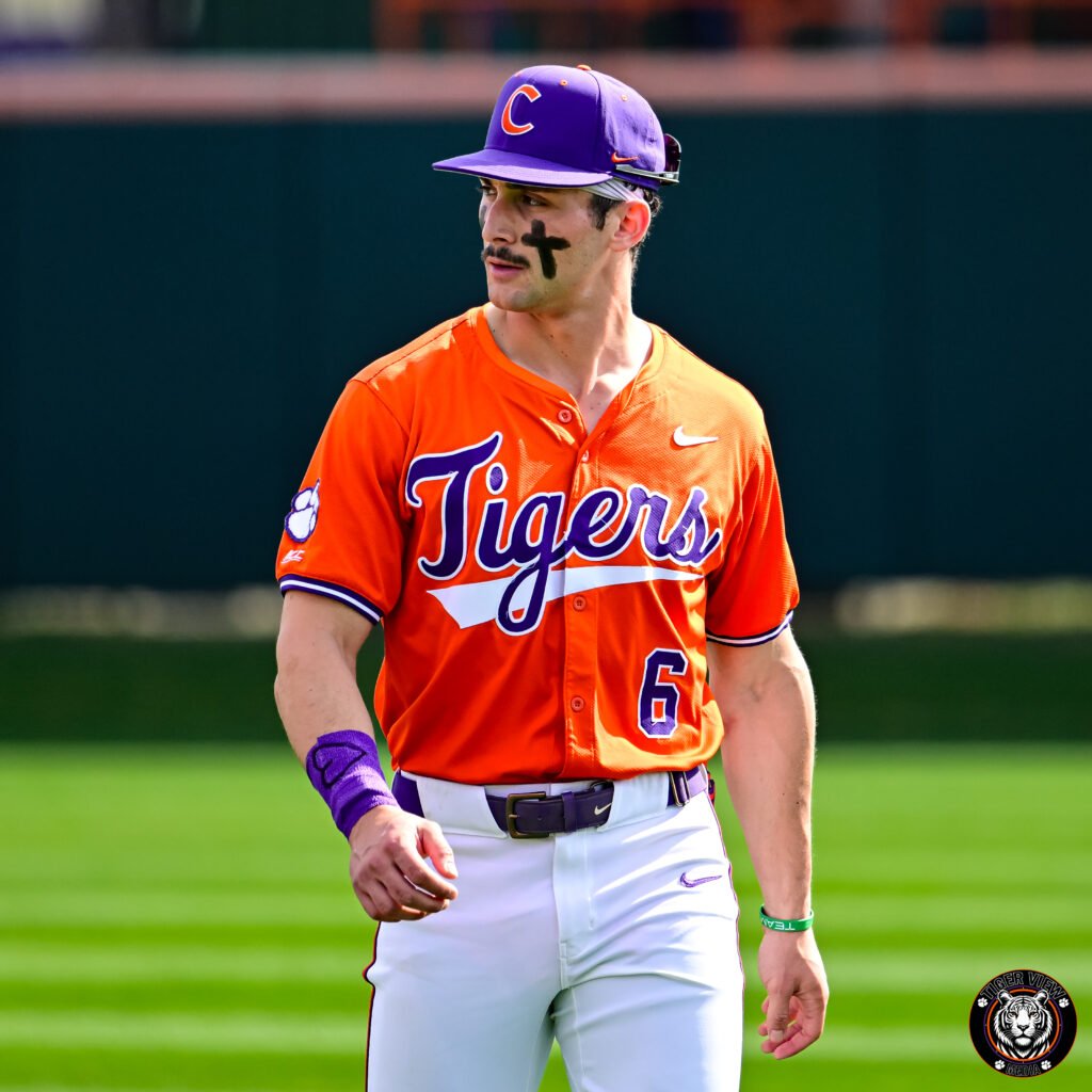 Dominic Listi in an orange Tigers baseball uniform