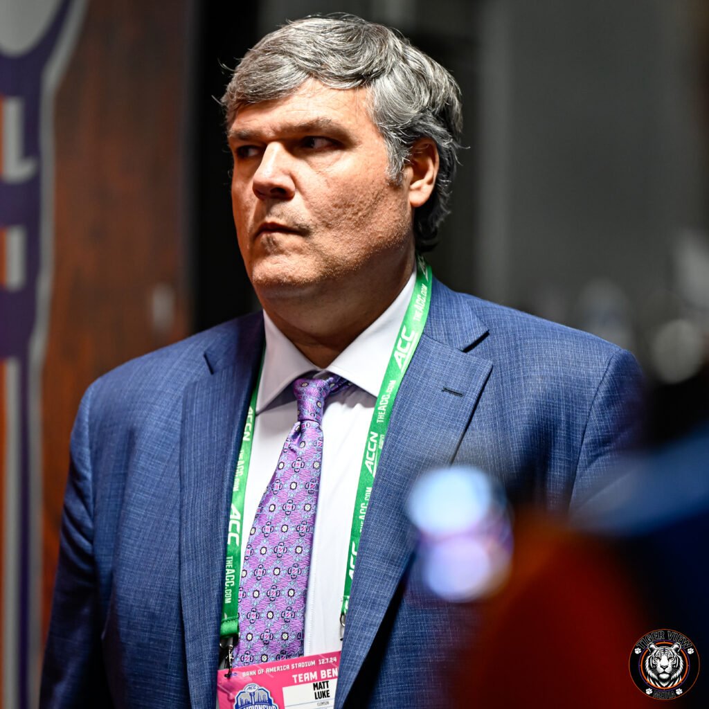 Offensive Lineman Coach Matt Luke looks determined and 